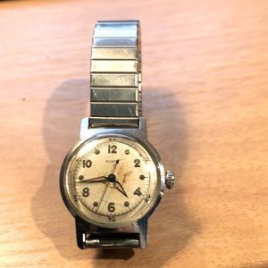 Elgin watch. Keeping good time. Asset from Recent Estate sale. Included is band.